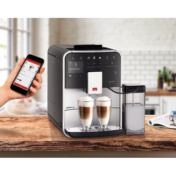 Melitta® Kaffeevollautomat Melitta Barista T Smart Silber 6761413 10 – Preparing fresh coffee in stylish kitchen with silver machine Melitta® Kaffeevollautomat Melitta Barista T Smart Silber 6761413 10 – Preparing fresh coffee in stylish kitchen with silver machine